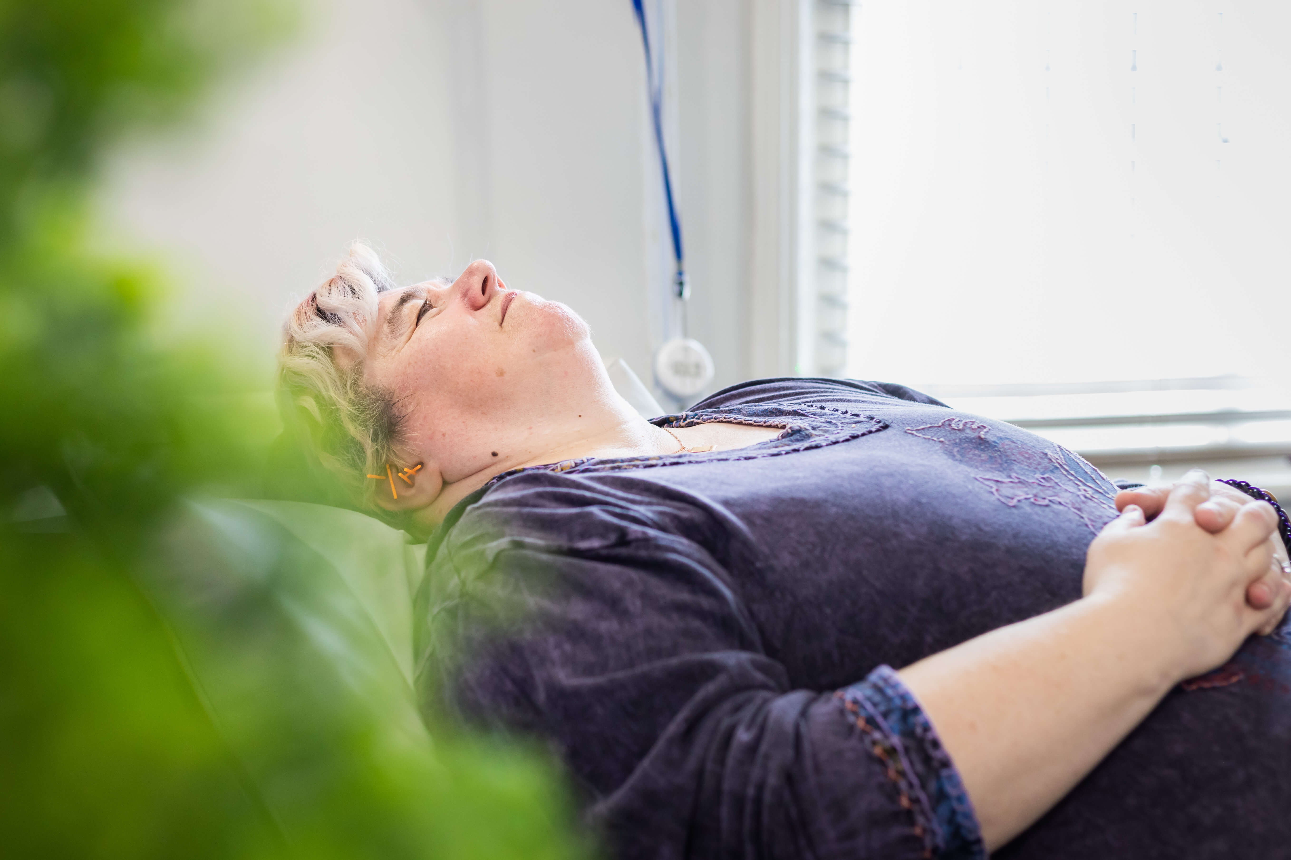 Acupuncture treatment session in a Middlesbrough clinic, supporting relaxation, stress reduction, and craving management during smoking cessation.