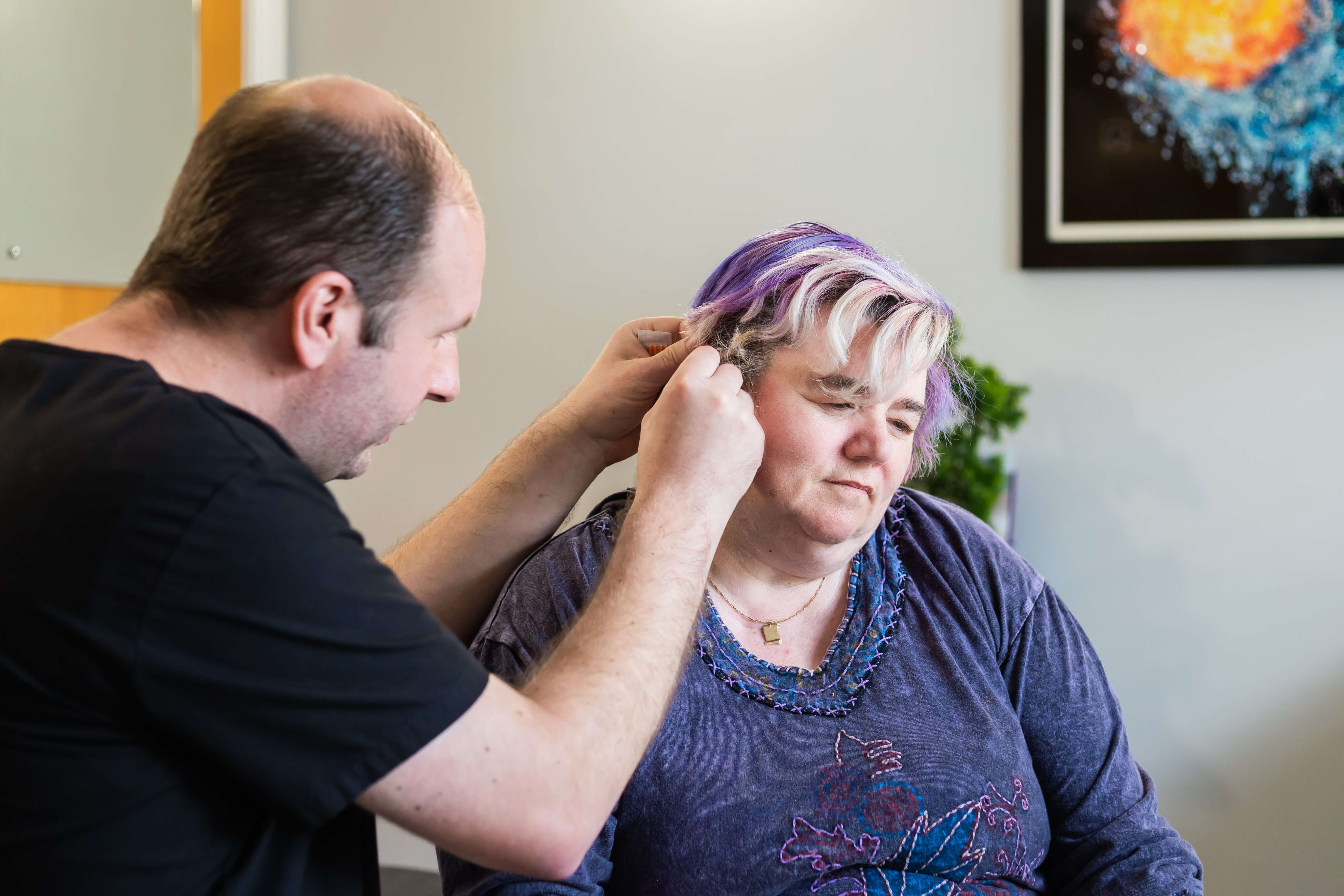 Ear acupuncture treatment for smoking cessation in a Middlesbrough clinic, supporting stress reduction and emotional regulation during quitting.